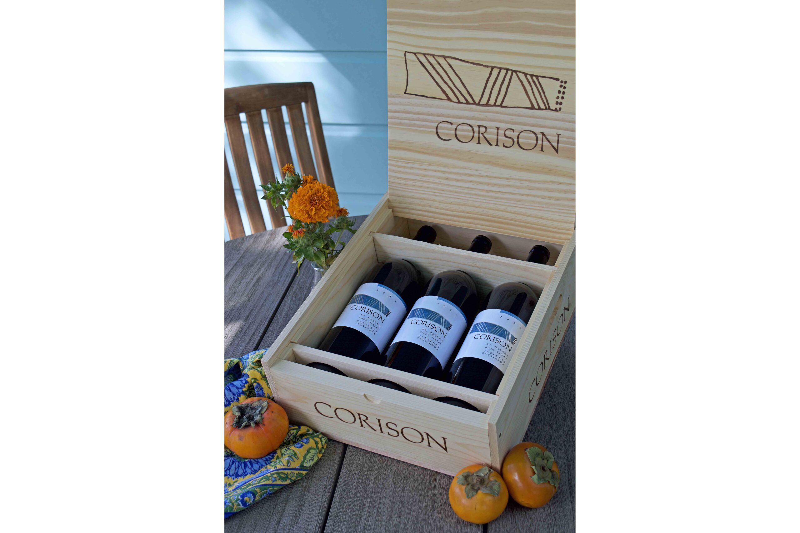 Three bottles of the 2020 Corison Napa Valley Cabernet Sauvignon on a fall holiday table