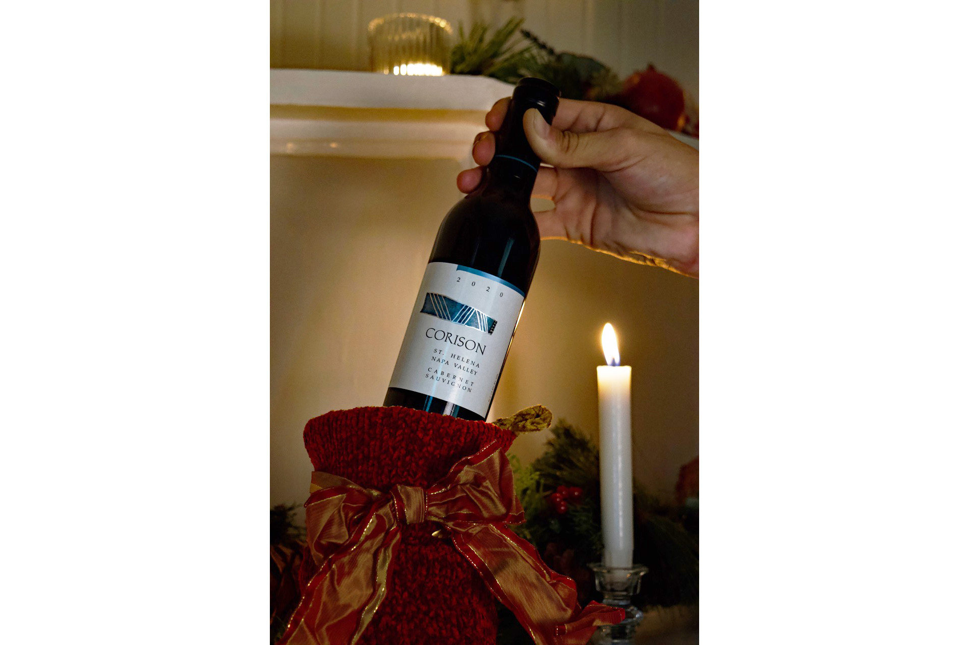 Half bottle of the 2020 Corison St. Helena Napa Valley Cabernet Sauvignon being taken out of a holiday stocking