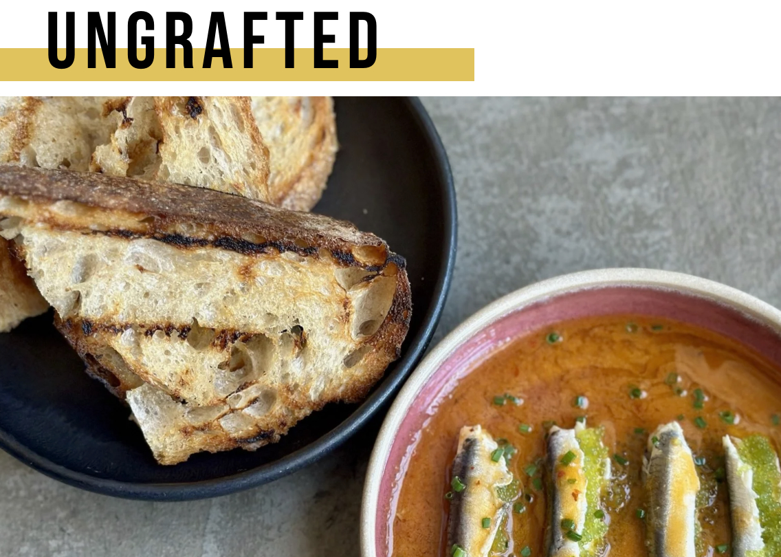 "Ungrafted" with plates with toasted bread and a caviar side dish.