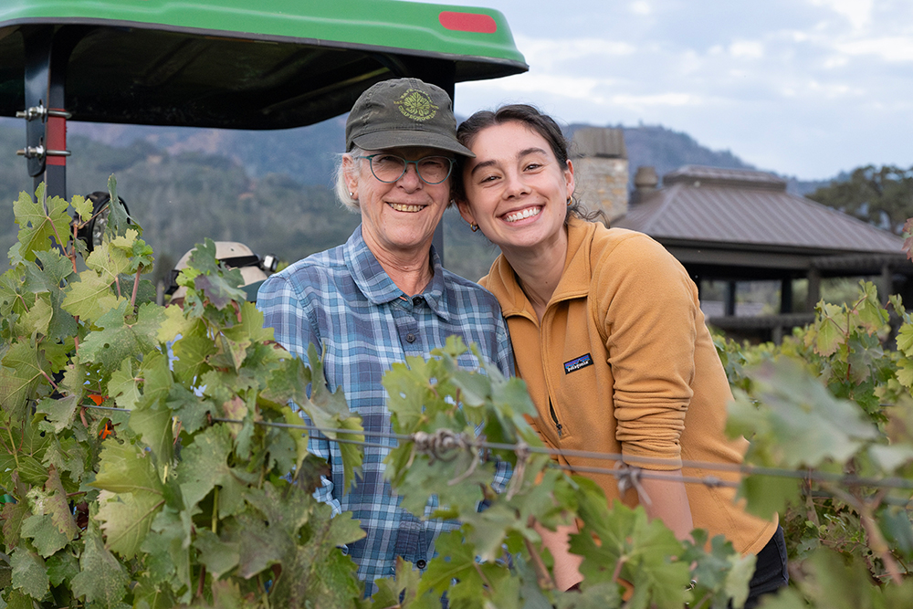 Cathy Corison and Grace Corison Martin out in the vineyard.